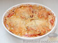 Тилапия, завёрнутая в кабачки, запечённая с помидорами