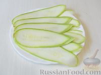 Тилапия, завёрнутая в кабачки, запечённая с помидорами