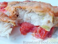 Тилапия, завёрнутая в кабачки, запечённая с помидорами