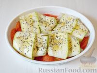 Тилапия, завёрнутая в кабачки, запечённая с помидорами