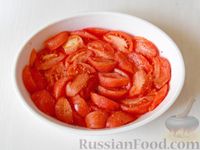 Тилапия, завёрнутая в кабачки, запечённая с помидорами